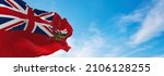 flag of Manitoba , Canada at cloudy sky background on sunset, panoramic view. Canadian travel and patriot concept. copy space for wide banner. 3d illustration