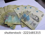Small photo of Indonesian Rupiah. the latest printed rupiah denomination and has a slightly slimmer size and has a slightly brighter color than the original. and has excellent security features.