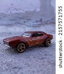 Small photo of Bekasi, Indonesia - October 26th, 2021 - Hot Wheels Type 67 Diecast Car Camaro HW Flames™