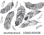 set of feathers hand drawn... | Shutterstock . vector #1068140438