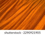 background and texture of smooth treated wood close-up diagonally.