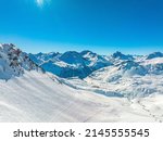 Small photo of Alpine ski resort St. Anton am Arlberg in winter time. Beautiful view of the Alpine mountains. Aerial view.