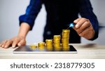 Small photo of Business putting gold coins in piles of gold saving money for future and retirement concept. growing power of compound interest. wealth stock investment. coin with funding that grows.