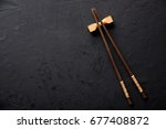 chopsticks on dark table