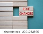 Small photo of Role changes symbol. Concept words Role changes on wooden blocks. Beautiful grey green background. Business and Role changes concept. Copy space.