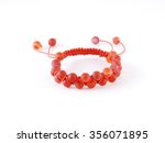 Buddhist bracelet shamballa with gems on a white background