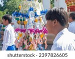 Small photo of SURATTANI, THAILAND- NOV. 06, 2023: Burmese people dress in national clothes, Came out happily during the Kathin merit-making festival of our Burmese brothers and sisters in Thailand