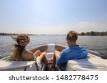Young Couple Boating On A Motor ...