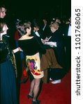 Small photo of Washington DC, USA, December 5, 1993 George Stephanopoulos the White House Director Of Commucations and his date for the evening arrive at the John F. Kennedy Center For The Prefroming Arts