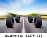 four automobile wheels rush on the road with high speed