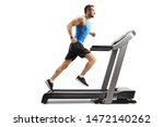 Full length shot of a young man in sportswear running on a professional treadmill isolated on white background