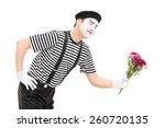 Mime Artist Giving Flowers To...