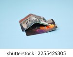 Small photo of Broken bend over damaged credit cards, detroyed and demolish, abolished the old credit cards before using the new credit cards. Preventing from being hacked and scammer. reFinancial an