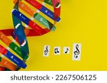 Small photo of DNA helix structure and note sticker as metaphor as music, gifted and talented. Genetics and inborn talents. DISCOVER YOUR CHILDREN’S INBORN TALENTS. Healthcare medical, science concept.
