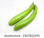 Small photo of Fresh stack long green eggplant long Thai eggplants, Eggplant,green Eggplant or (Solanum melongena L.) isolated on white background. Concept Organic vegetables. Healthy food