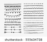 set of hand drawn lines and... | Shutterstock .eps vector #555634738
