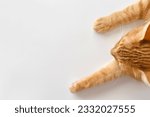 Happy ginger cat sleeping at home.  Cute tabby cat resting in a house.  Flat lay top view photo. Copy space. 