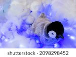 Small photo of Lacock, Chippenham,UK - December 16, 2018: Baby Penguin Polar animals Winter Womderland display in Whitehall garden centre, near Lacock in Wiltshire, England.