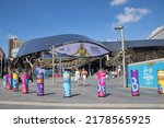 Small photo of Birmingham, UK - July 2022: Grand central station with commonwealth games branding on bollards and fence.