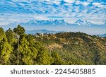 Small photo of Panoramic beautiful view of mount Trisul, Nanda Devi with the beautiful sky on the way to Binsar, Kasardevi, Almora Uttarakhand