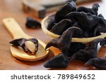 Small photo of Water caltrop or horn chestnut or water chestnut. It tastes like a potato and is good for health, and it also looks like buffalo. Water chestnuts boiled. Selective focus.