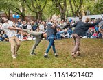 Small photo of Riga. Latvia. August 18, 2018. Celebration the foundation day of the city. Audience watches the performance of the modern circus "Centrifugal Force".