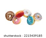 Confectionery as sweets and doughnuts collage isolated on white background. Colourful donuts flying over white with clipping path. Full Depth of field.
