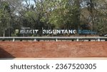 Small photo of Palembang, South Sumatra, Indonesia - 26 September 2023 : Stainless embossed letters installed above the building gallery in the city tourist forest park, TEXT : BUKIT SIGUNTANG PARK BANK SUMSEL BABEL