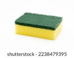 Cleaning concept, Yellow sponge for dishwashing in kitchen isolated on white background.