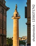 Small photo of Historic ancient Traian Column monument in Rome