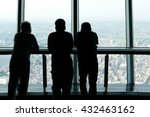 men watch Japan Tokyo city from a tower