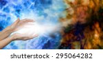 Small photo of Dispersing Negative Energies - Female hands on water blue background with stream of white energy between hands appearing to disperse mucky brown energy field on right hand side