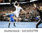 Small photo of Berlin, Germany, January 12, 2019: Serbian handball player Zoran Nikolic shooting the ball during the Men's Handball World Cup 2019 at the Mercedes-Benz Arena in Berlin.