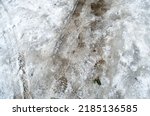 Small photo of Trace of car and footstep on the snow ground pathway during frozen cold winter
