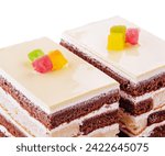 Small photo of Delicious multilayer cocoa sponge cake with sugar mass