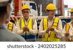 Small photo of Happiness and joyful atmosphere, smiling factory worker and engineer celebrate with factory executive or manager after achieve factory output and surpassing the maximum quota. Exemplifying