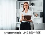 Small photo of Psychologist woman in clinic office professional portrait with friendly smile feeling inviting for patient to visit the psychologist. The experienced and confident psychologist is utmost specialist
