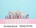 Set Of Makeup Brushes On Pink...