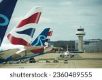 Small photo of London Gatwick Airport , London , UK 26 July 2023 : Famous Airlines stand by and landing on Gatwick airport
