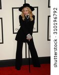 Small photo of LOS ANGELES - JAN 26: Madonna arrives at the 56th Annual Grammy Awards Arrivals on January 26, 2014 in Los Angeles, CA
