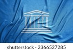 Small photo of The United Nations Educational, Scientific and Cultural Organization with UNESCO logo - Real Fabric Textured Flag. Promoting world peace and security through international cooperation in education.