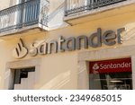 Small photo of Setubal, Portugal. 08 August 2023. Santander logo sign. formerly Sovereign Bank, is an American bank that operates as a wholly owned subsidiary of Spain's Santander Group