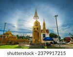 Small photo of PHITSANULOK, THAILAND - October 2,2023:Sun halo with blue sky with Buddha statue at in Temple (Thai language:Wat Chan West) is a Buddhist temple It is a major tourist attraction Phitsanulok,Thailand