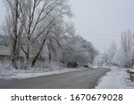 Street with its structures, buildings and structures, trees, landscape under a layer of umbilical snow in the winter. Beautiful, Uy landscape on the housing estate Northern, city Dnipro Ukraine.