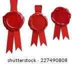 Red wax seal stamps with ribbon isolated on white