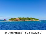 Small photo of Close view of the tiny Beachcomber Island in Fiji