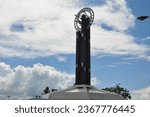 Small photo of Pontianak Indonesia, September 25, 2023 - Pontianak equator monument on a sunny day. The equator monument is a marker of zero degrees at the equator, and is located in the city of Pontianak