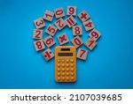 Calculator And A Wooden Number...