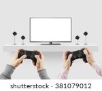 Man hold gamepad in hands in front of blank tv screen mock up playing game. Clear monitor mockup with gamer first person. Men play video games on console station. People gaming contest. Two players.