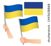 ukraine flag in hand. patriotic ... | Shutterstock . vector #1445638868